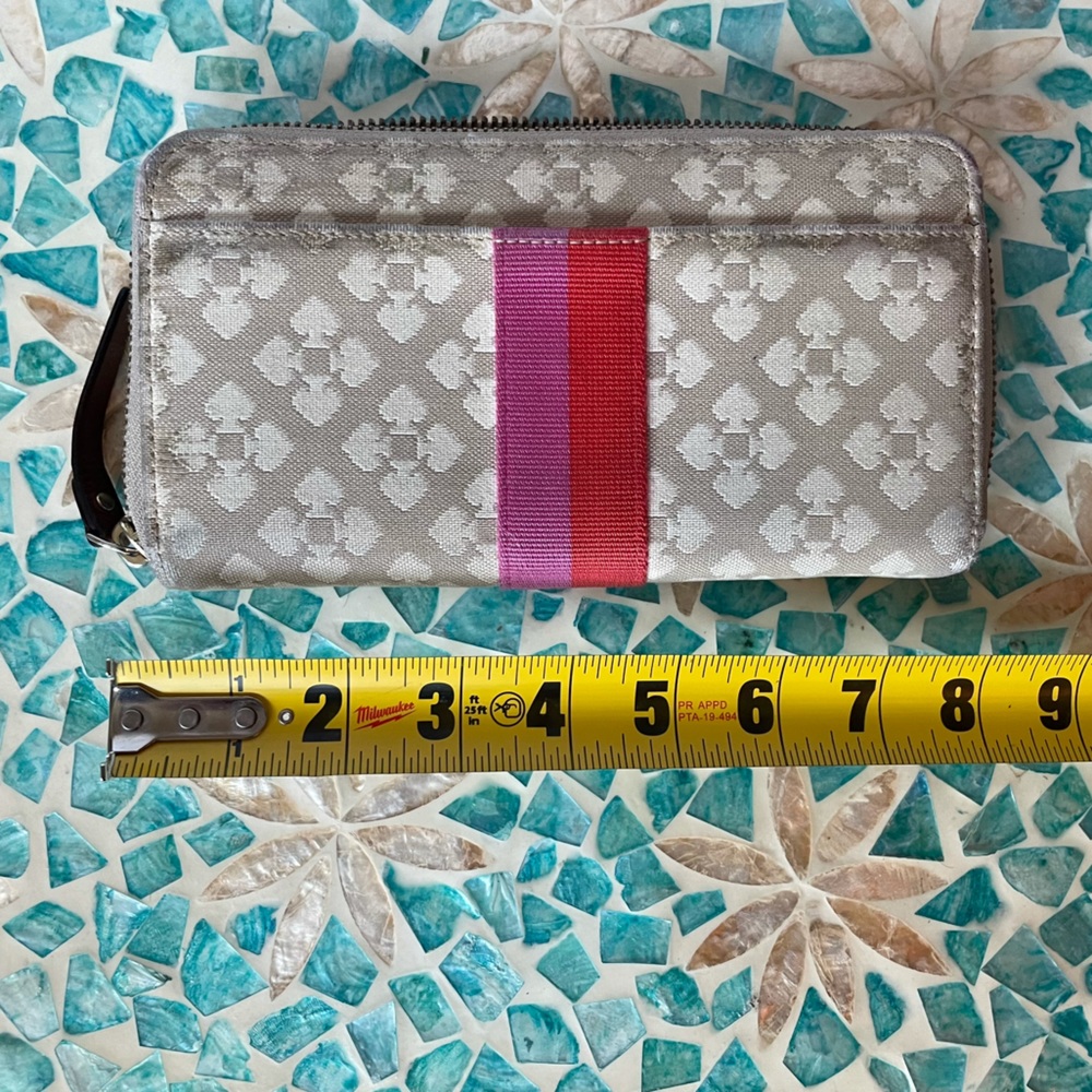 Kate spade tan canvas long zipper wallet with pink and red stripe